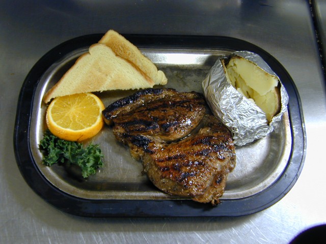 12 oz. Sirloin Steak with Baked Potato. Salad Bar included of Captain Joe's Seafood, Brunswick, Georgia