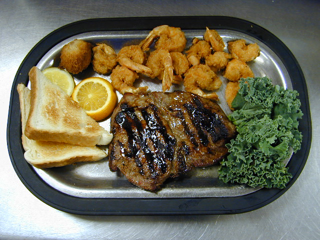 Surf and Turf Dinner with Texas Toast. Choice of Potato and Salad Bar included of Captain Joe's Seafood, Brunswick, Georgia